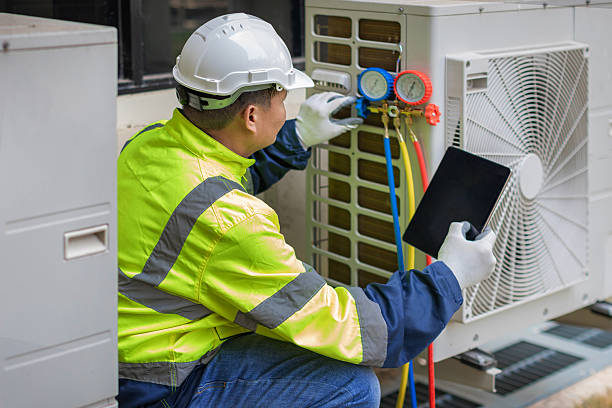 Professional Air Duct Cleaning technician working in North Houston, TX